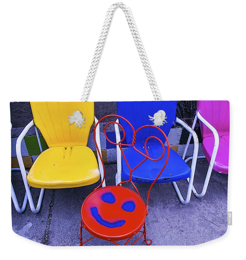 Smile Weekender Tote Bag featuring the photograph Smile On Chair Seat by Garry Gay