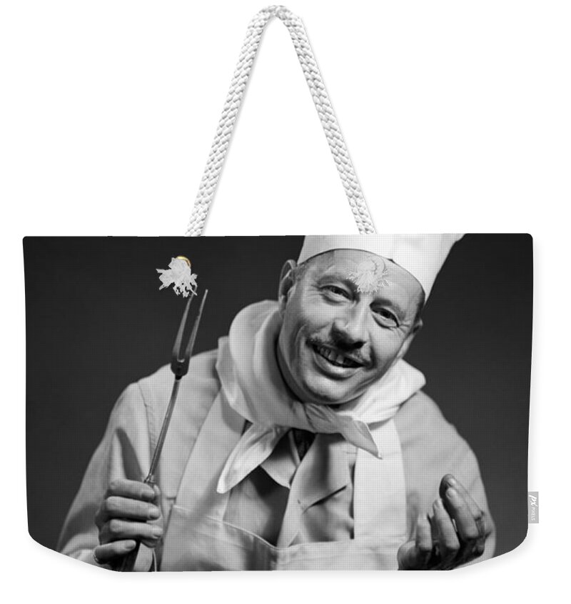 1950s Weekender Tote Bag featuring the photograph Smiling Chef, C.1950s by Debrocke/ClassicStock