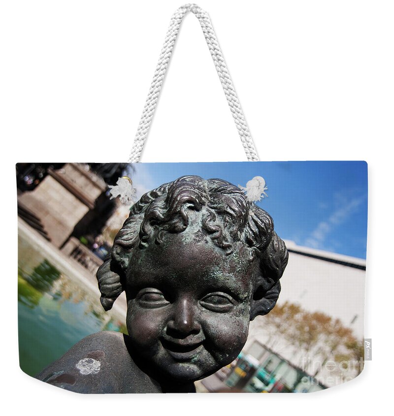 Plaza De Catalunya Weekender Tote Bag featuring the photograph Smiling Cherub by Agusti Pardo Rossello
