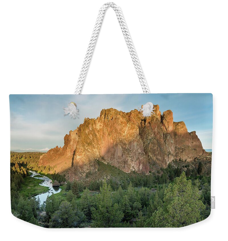 Smith Rock Weekender Tote Bag featuring the photograph Smith Rock First Light by Greg Nyquist