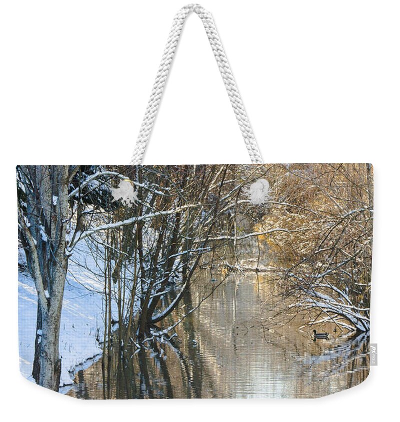 Reflections Weekender Tote Bag featuring the photograph Snow in the Channel by Joni Eskridge