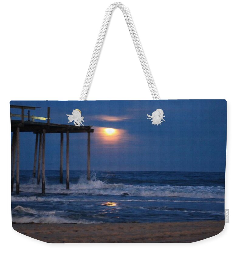 Planet Weekender Tote Bag featuring the photograph Snow Moon at the OC Fishing Pier by Robert Banach