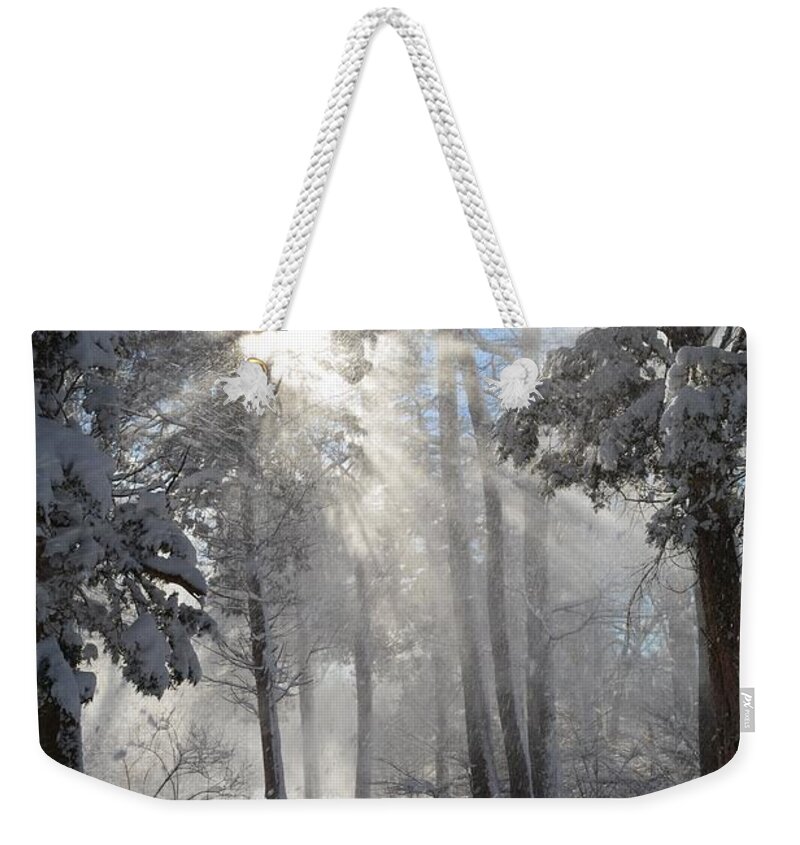 Sunburst Weekender Tote Bag featuring the photograph Snowflakes and Sunbeams by Dani McEvoy
