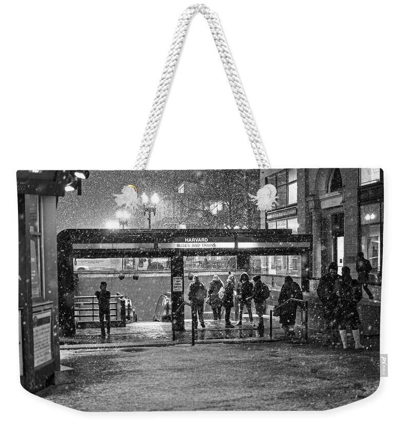 Harvard Weekender Tote Bag featuring the photograph Snowy Harvard Square Night- Harvard T Station Black and White by Toby McGuire