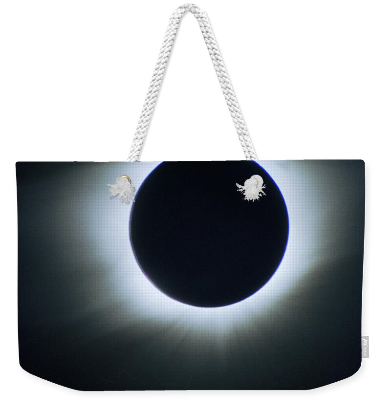 Solar Eclipse Weekender Tote Bag featuring the photograph Solar Eclipse Aruba 1998 by Lon Dittrick