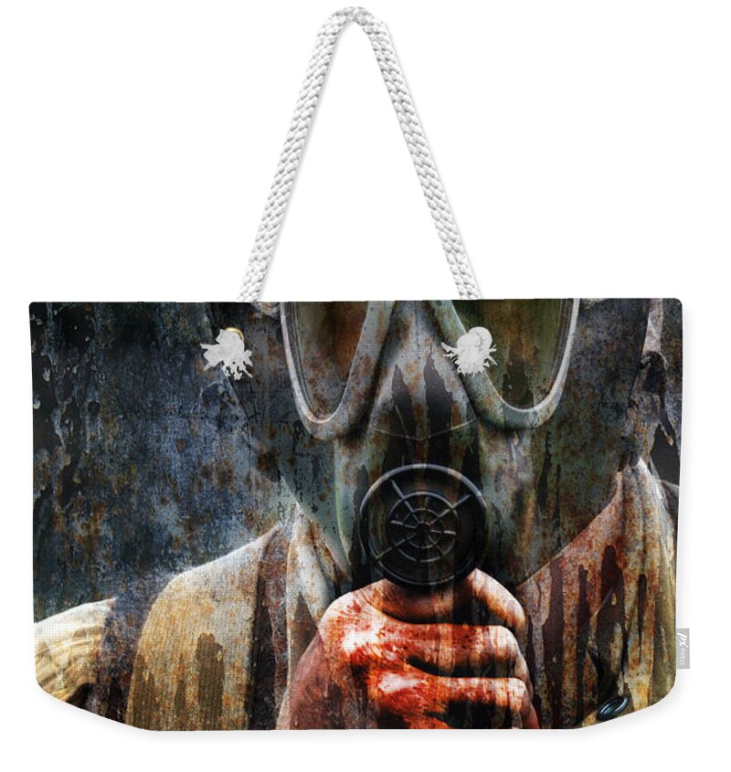 Soldier Weekender Tote Bag featuring the photograph Soldier in World War 2 Gas Mask by Jill Battaglia