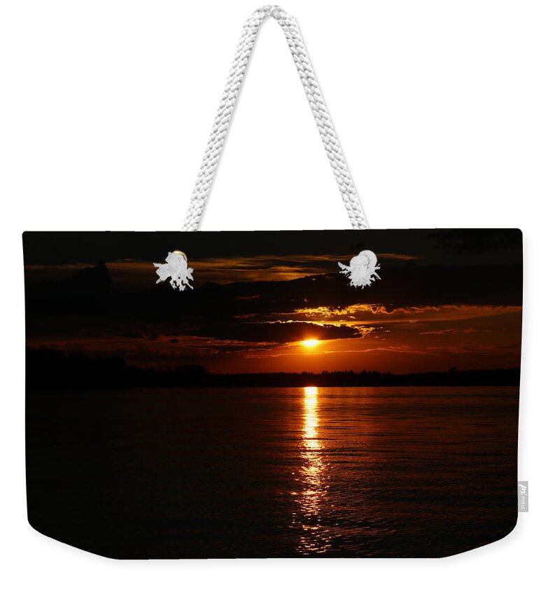 Minnesota Weekender Tote Bag featuring the photograph Solstice Sunset by Hans Brakob