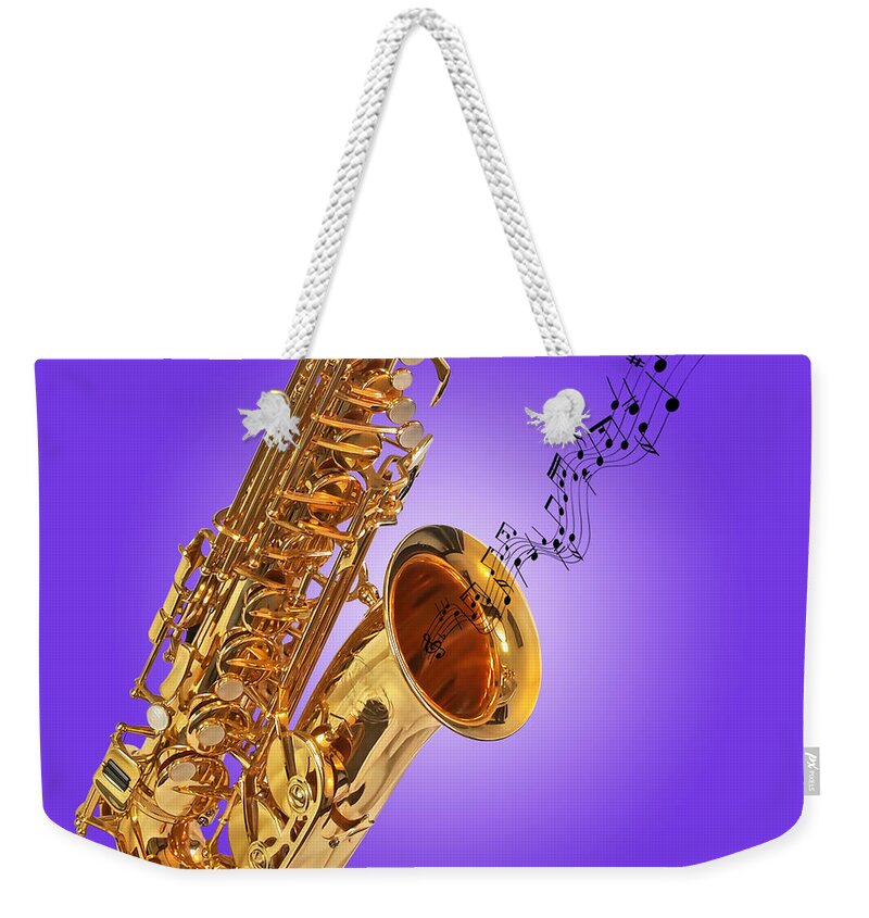 Music Weekender Tote Bag featuring the photograph Sounds of the Sax in Purple by Gill Billington