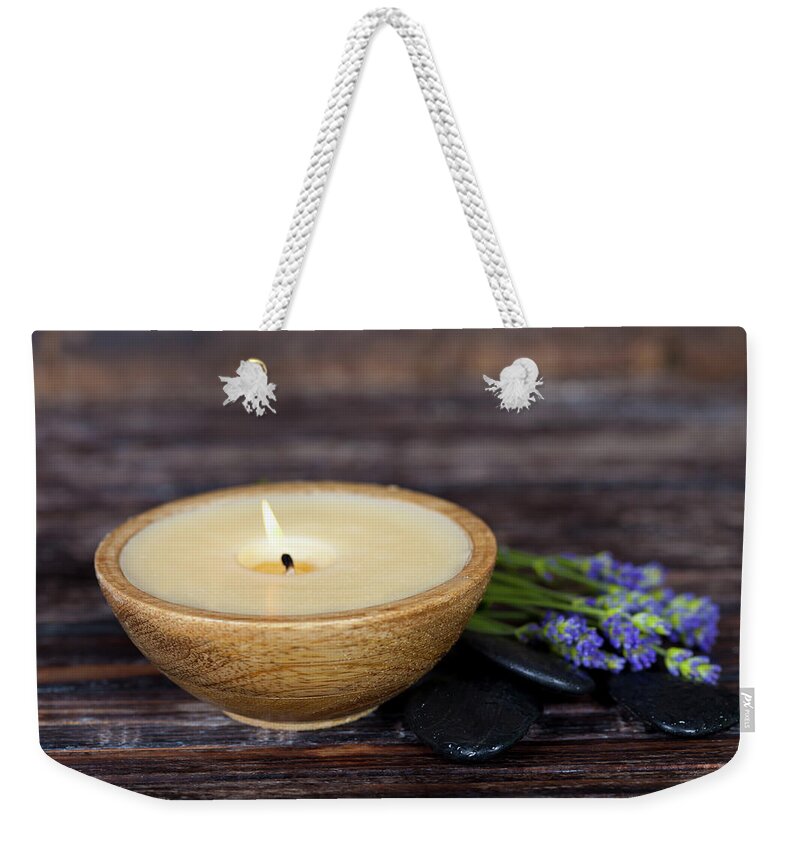 Candle Weekender Tote Bag featuring the photograph spa by Natalia Klenova