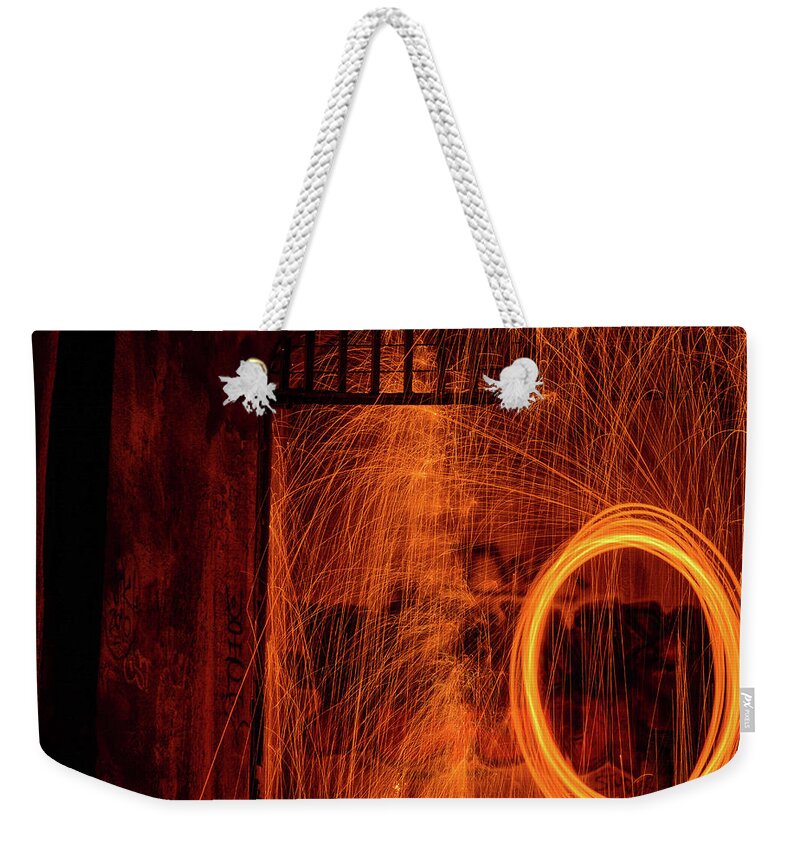  Weekender Tote Bag featuring the photograph Sparky by Jim Figgins