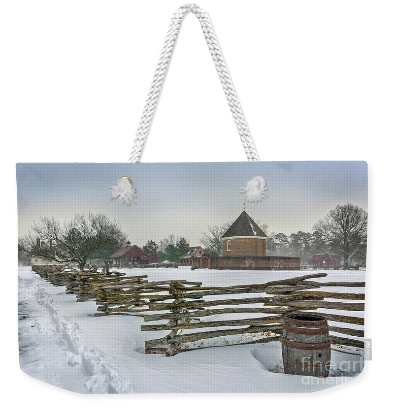 Split Rail Fence In Winter Colonial Williamsburg Weekender Tote Bag featuring the photograph Split Rail Fence in Front of Colonial Williamsburg Magazine by Karen Jorstad