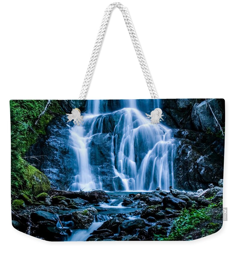 Granville Weekender Tote Bag featuring the photograph Spring at Moss Glen falls by Jeff Folger