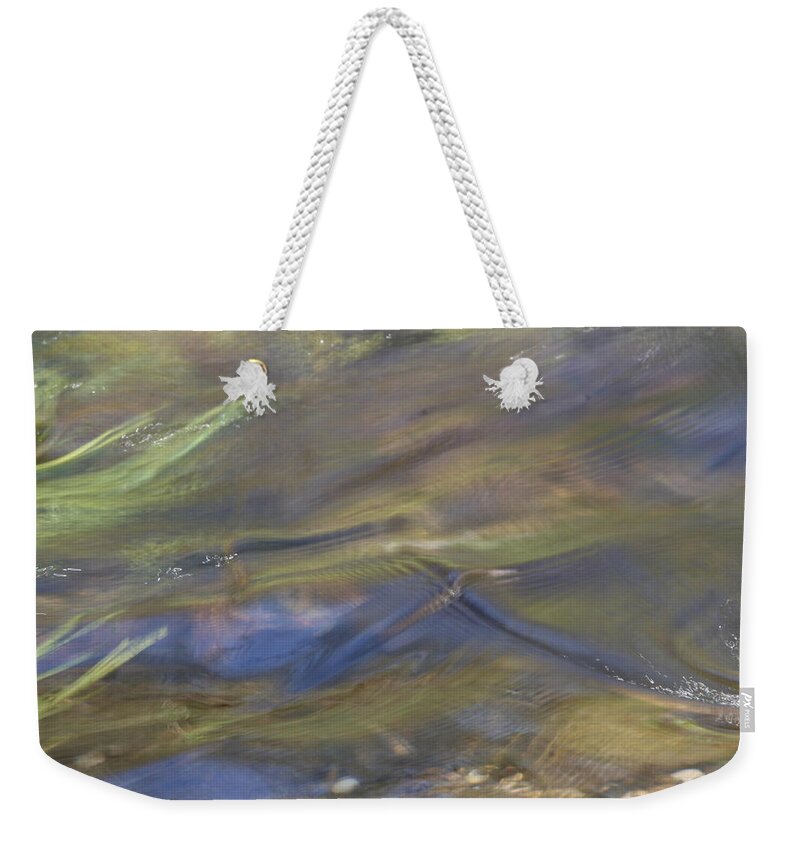 Spring Turbulence Weekender Tote Bag featuring the photograph Spring Turbulence by Dylan Punke