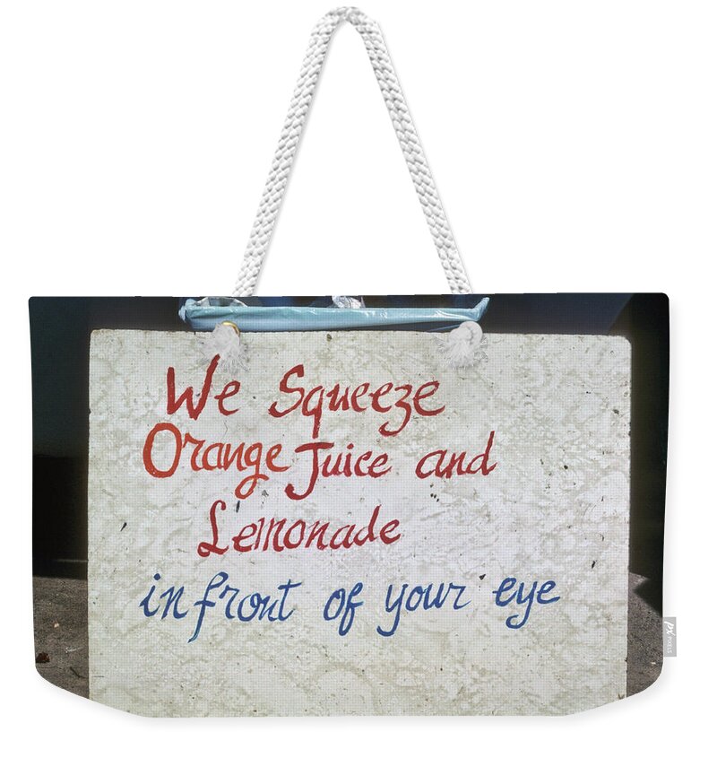 Color Weekender Tote Bag featuring the photograph Squeezed Juice sign by Frank DiMarco