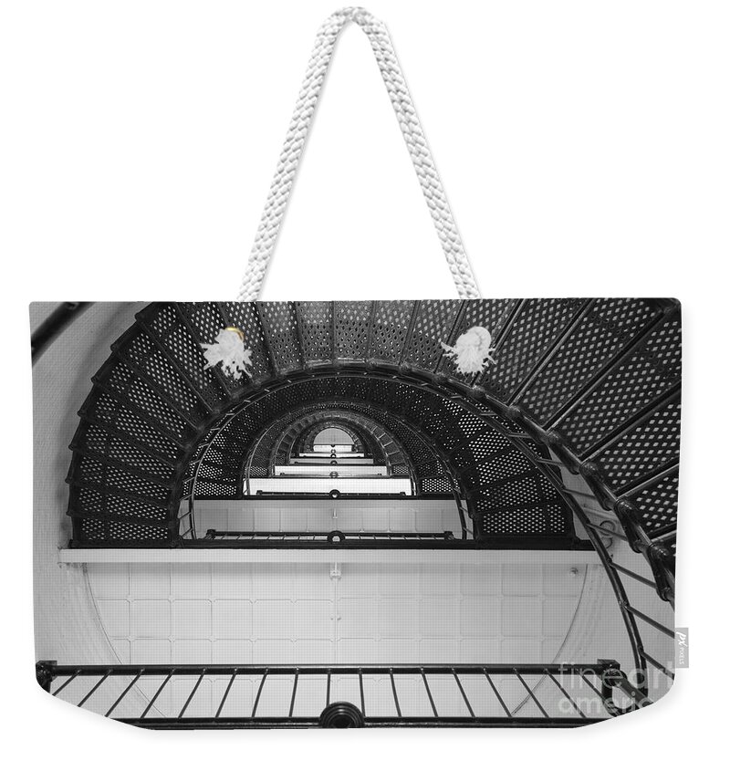 Clarence Holmes Weekender Tote Bag featuring the photograph St. Augustine Lighthouse Spiral Staircase III by Clarence Holmes