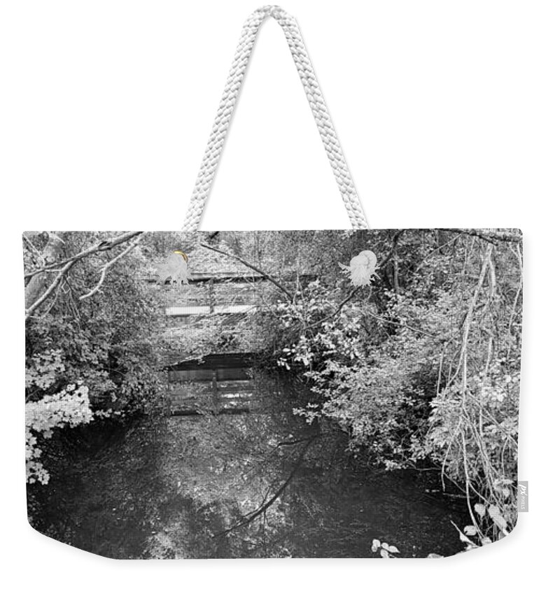 Bridge Weekender Tote Bag featuring the photograph St James Water Bw by Rob Hans