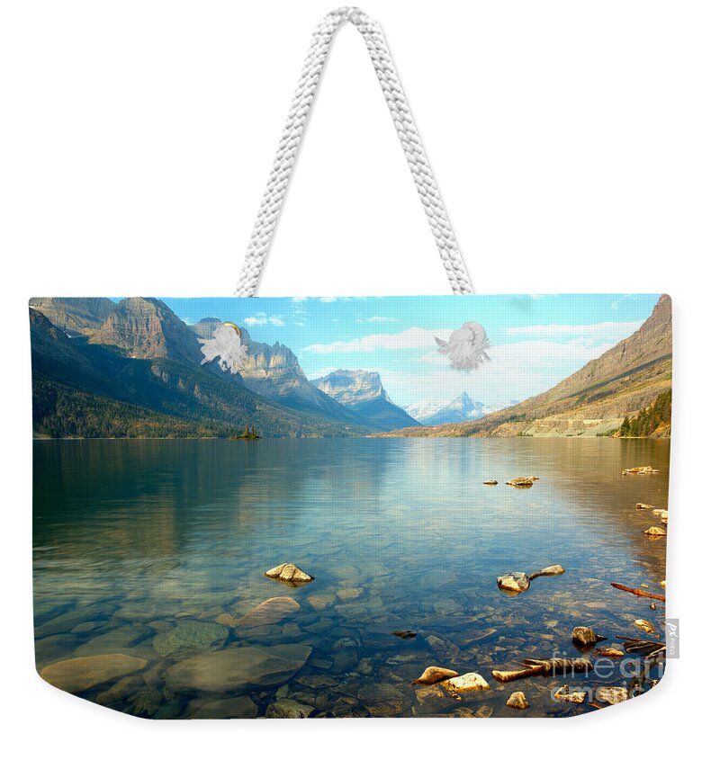 St Mary Weekender Tote Bag featuring the photograph St Mary Ripples Over Rocks by Adam Jewell