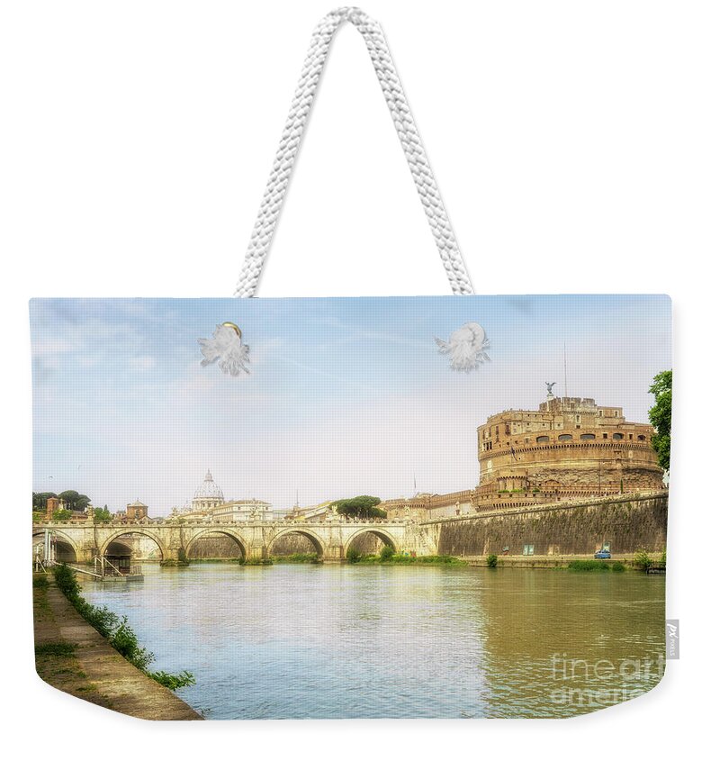 Castle Of Holy Angel Weekender Tote Bag featuring the photograph St Peter's Basilica and Castel Sant Angelo Rome by Ann Garrett