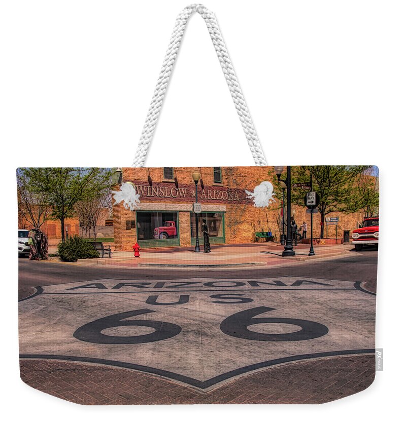 Winslow Arizona Weekender Tote Bag featuring the photograph Standin on the corner by Jeff Folger
