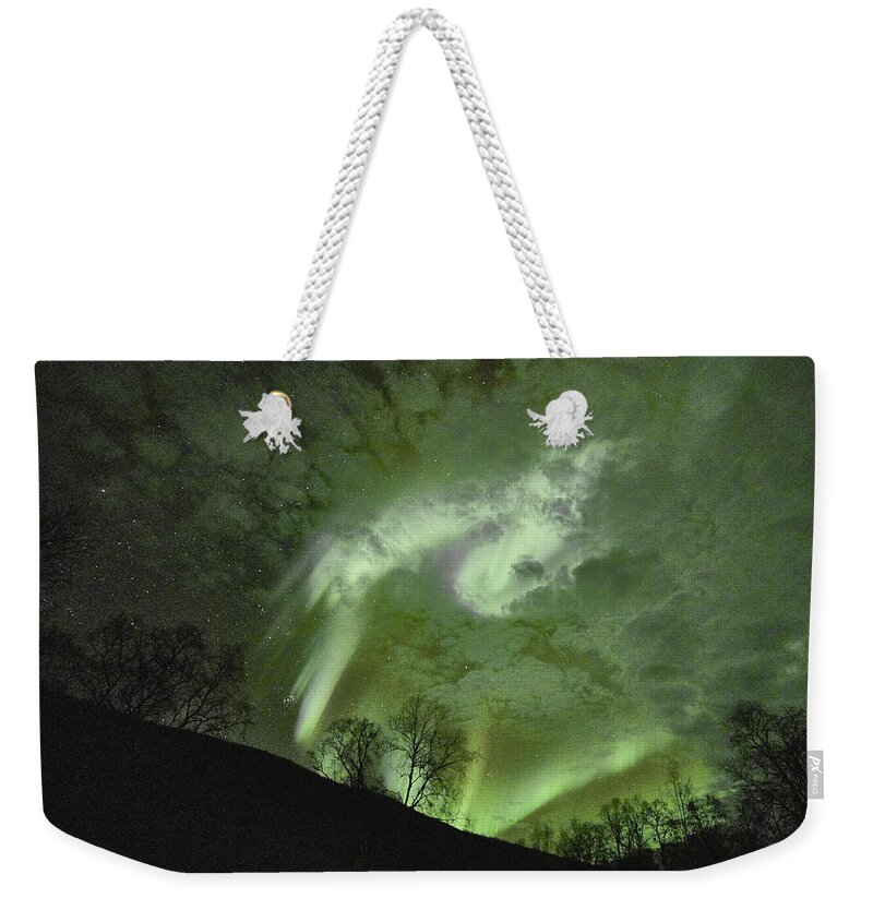 Sky Weekender Tote Bag featuring the photograph Stars, Clouds and Northern Lights by Pekka Sammallahti