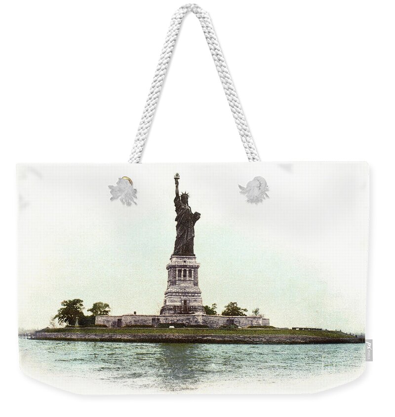 1900 Weekender Tote Bag featuring the photograph Statue Of Liberty, 1900 by Granger