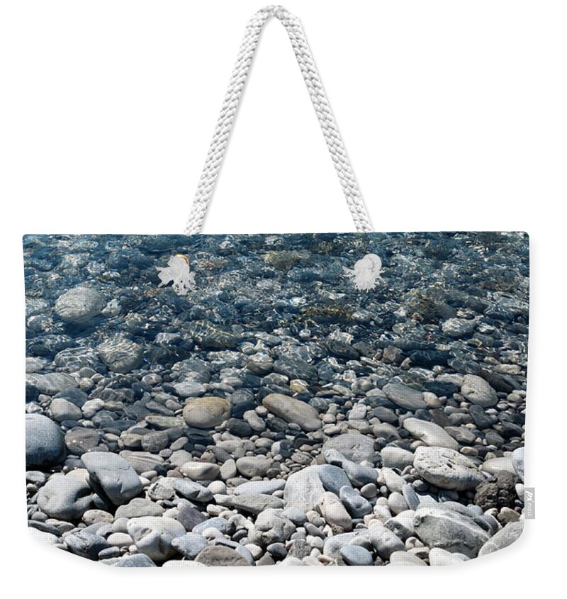 Nature Weekender Tote Bag featuring the photograph Stepping into water by Helga Novelli