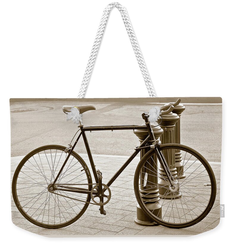Bicycle Weekender Tote Bag featuring the photograph Still Life With Trek Bike In Sepia by Ben and Raisa Gertsberg