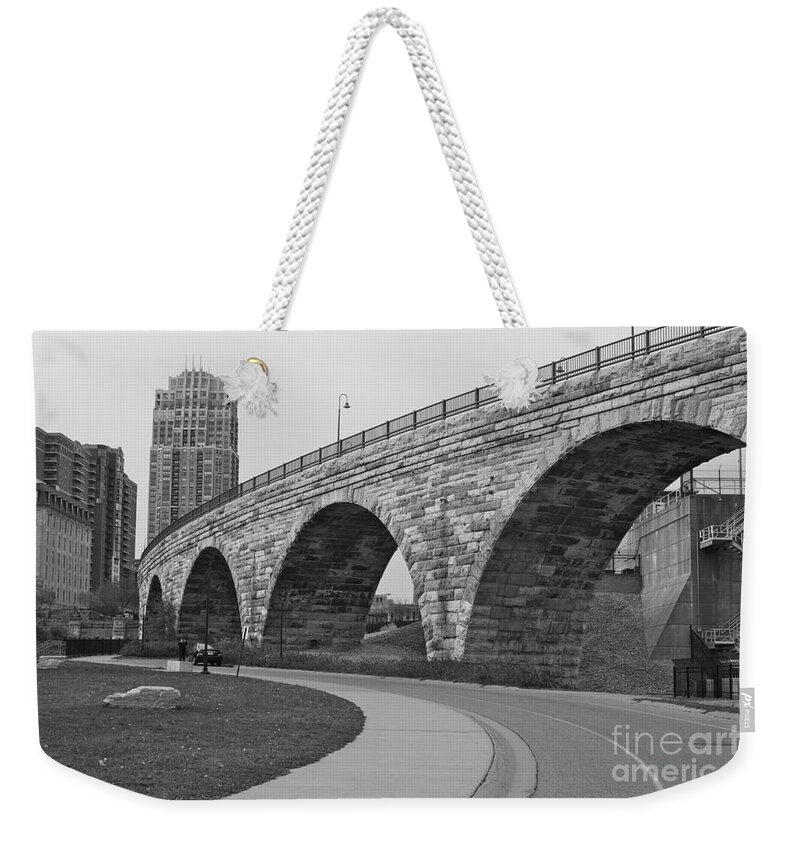 Bridge Weekender Tote Bag featuring the photograph Stone Arch Bridge by Alice Mainville