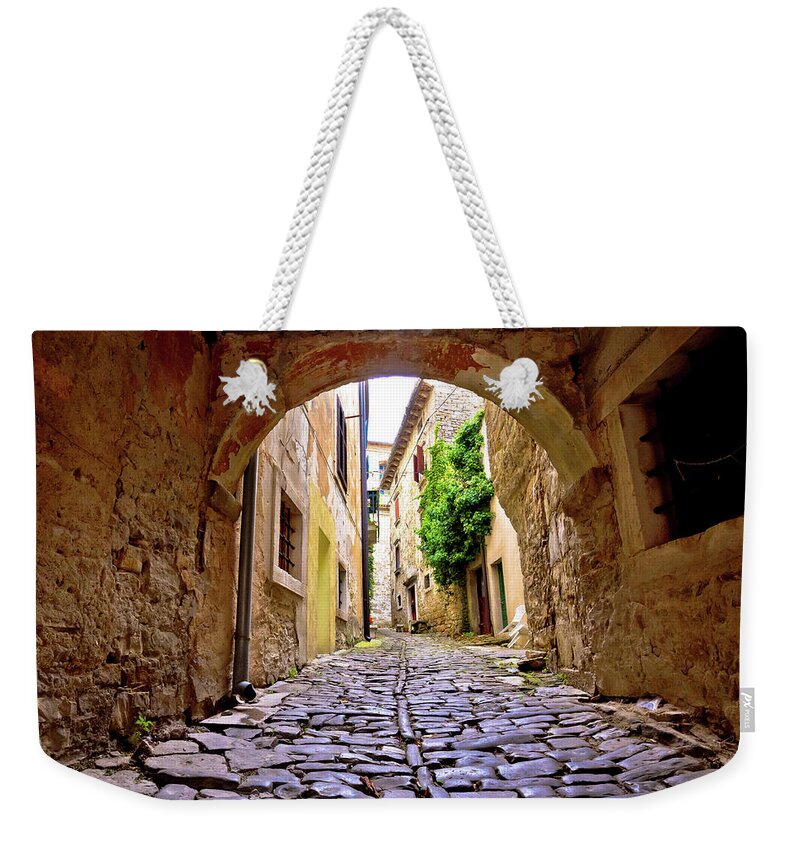 Groznjan Weekender Tote Bag featuring the photograph Stone town of Groznjan old street by Brch Photography