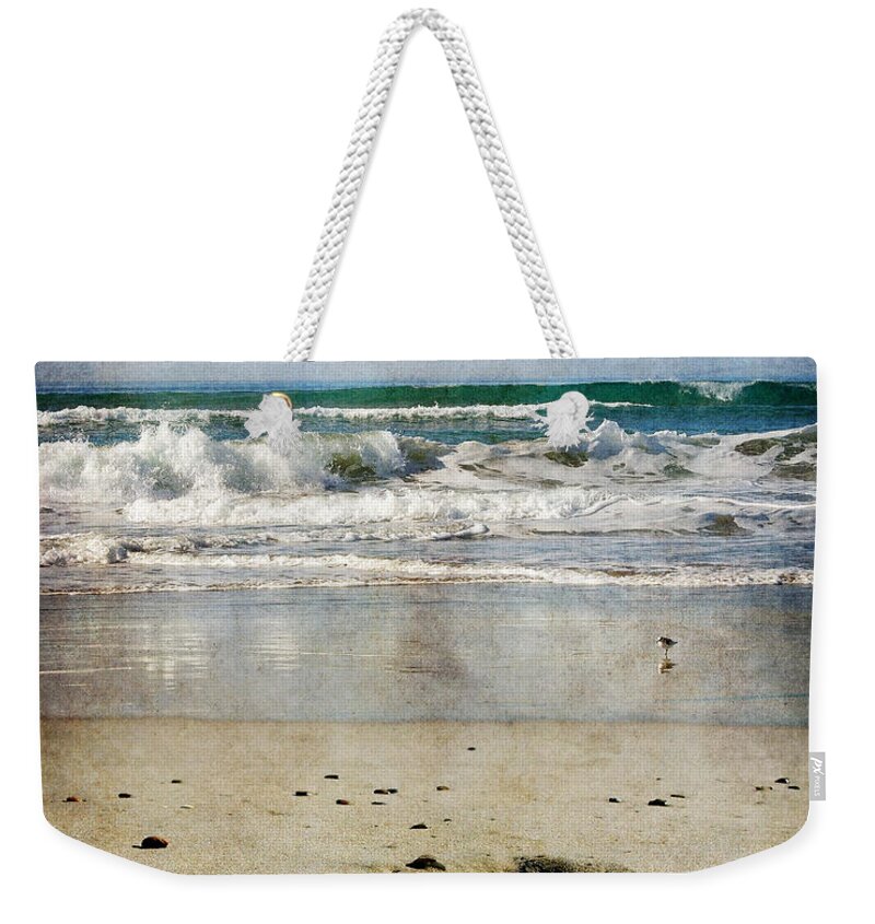 Zmudowski Weekender Tote Bag featuring the photograph Stones Along the Shore by Laura Iverson