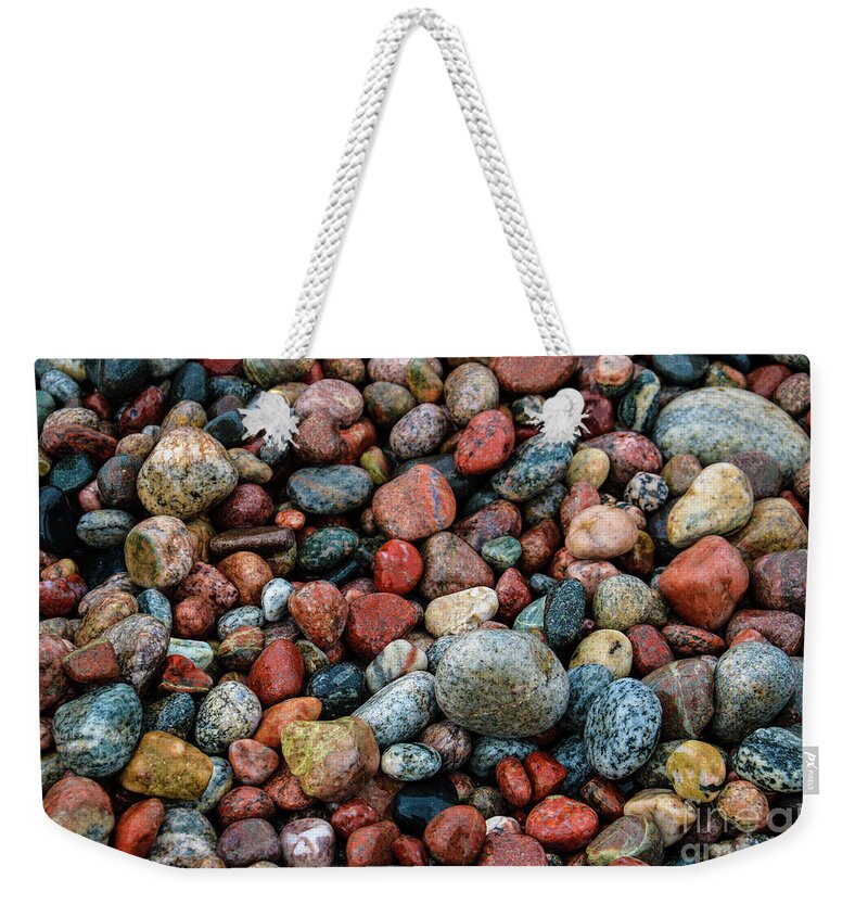 Stones Of Lake Superior Weekender Tote Bag featuring the photograph Stones of Lake Superior by Rachel Cohen