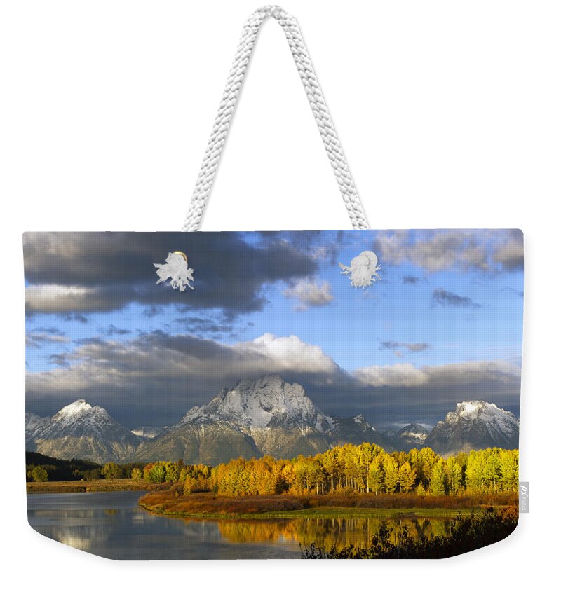 Storm Weekender Tote Bag featuring the photograph Storm over the Ox Bow and Mt Moran by Gary Langley