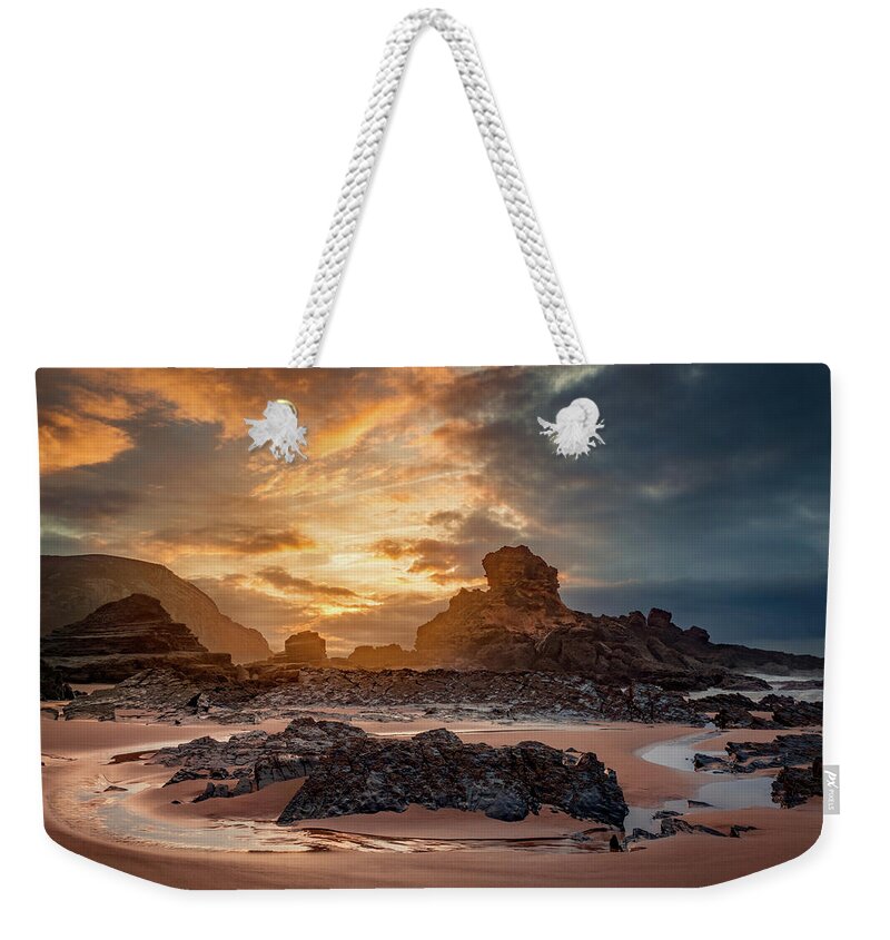 Castelejo Weekender Tote Bag featuring the photograph Stormy evening on Praia do Castelejo by Dmytro Korol