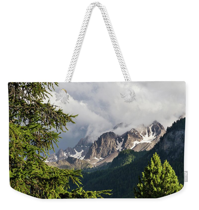 Mountain Landscape Weekender Tote Bag featuring the photograph Stormy evening by Paul MAURICE