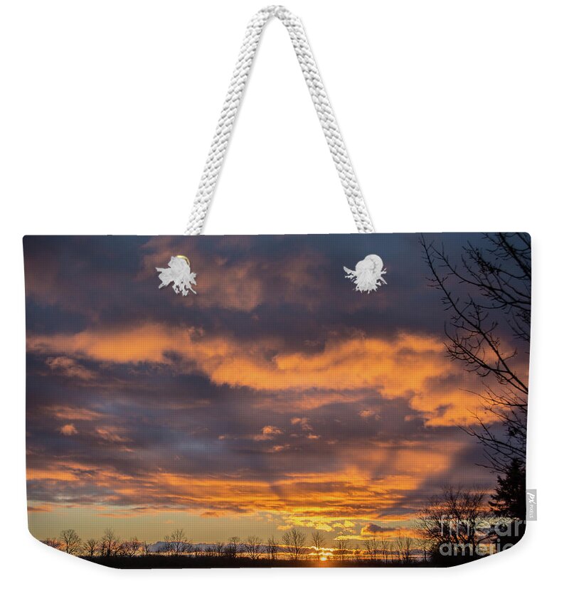 Cheryl Baxter Photography Weekender Tote Bag featuring the photograph Stormy Sky Sunrise by Cheryl Baxter