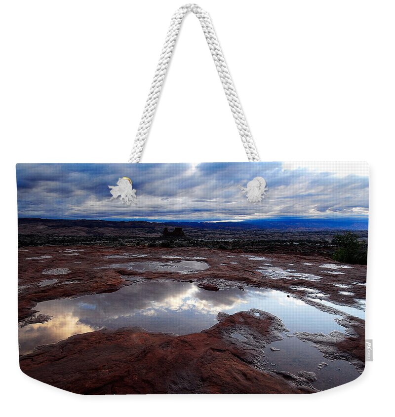 Reflection Weekender Tote Bag featuring the photograph Stormy Sunrise by Harry Spitz