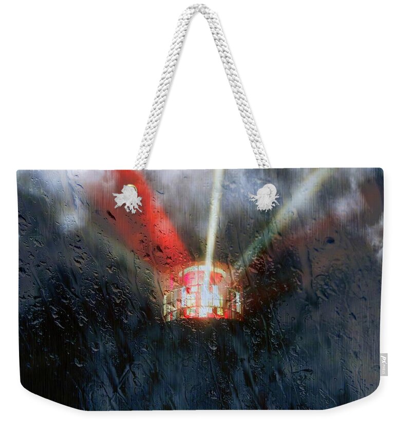 Lighthouse Weekender Tote Bag featuring the photograph Stormy Weather by Nick Kloepping
