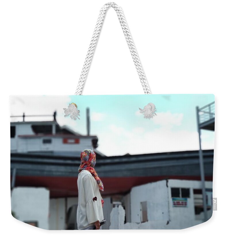  Weekender Tote Bag featuring the photograph Stranded Boat by Deni Dc