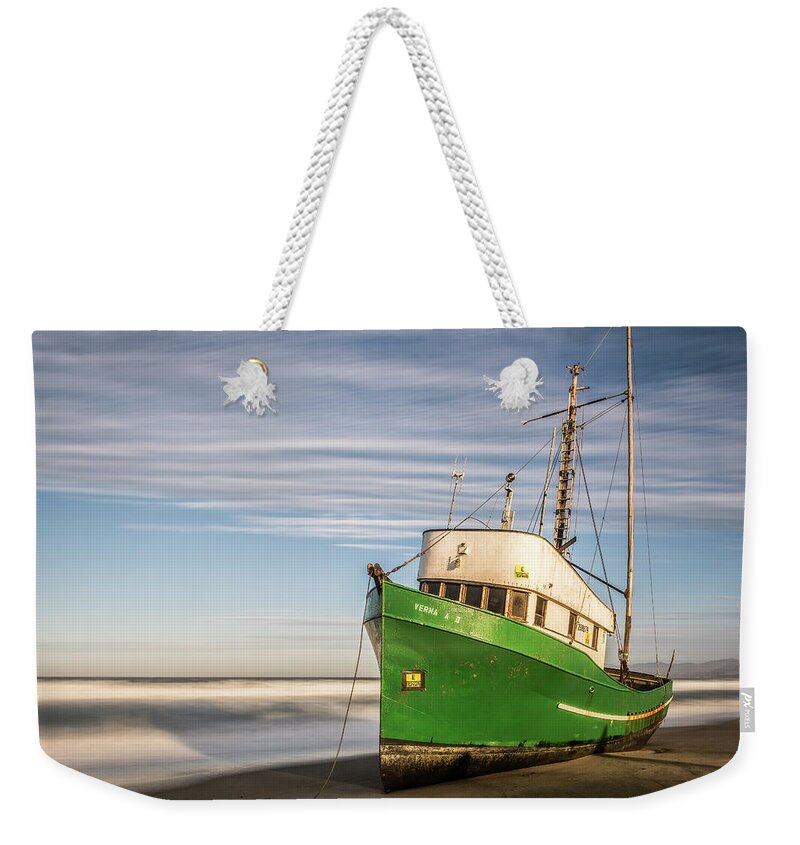 Ship Weekender Tote Bag featuring the photograph Stranded on the Beach by Jon Glaser