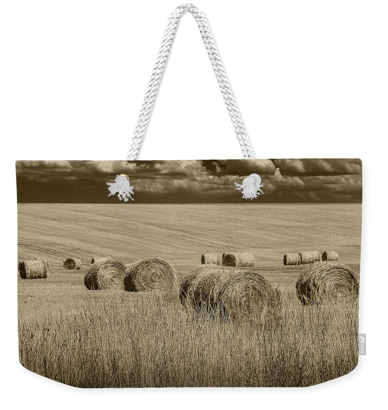 Art Weekender Tote Bag featuring the photograph Summer Harvest Field with Hay Bales in Sepia by Randall Nyhof