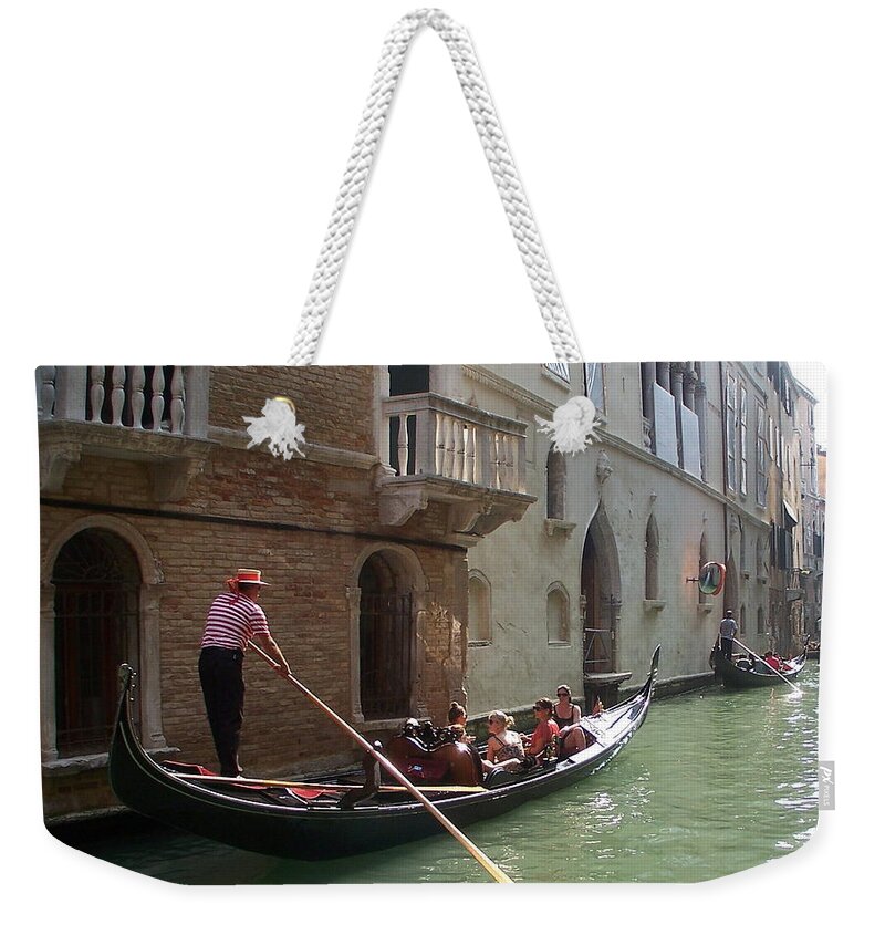 Venice Weekender Tote Bag featuring the photograph Sun in a gondola I by Elena Perelman
