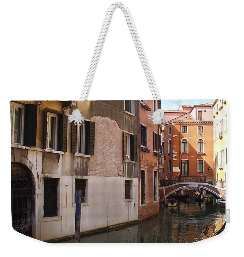 Venice Weekender Tote Bag featuring the photograph Sun in a gondola IV by Elena Perelman