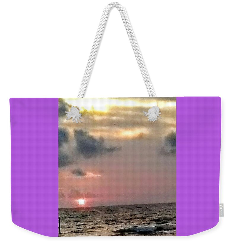 Clearwater Weekender Tote Bag featuring the photograph Sundown by Suzanne Berthier
