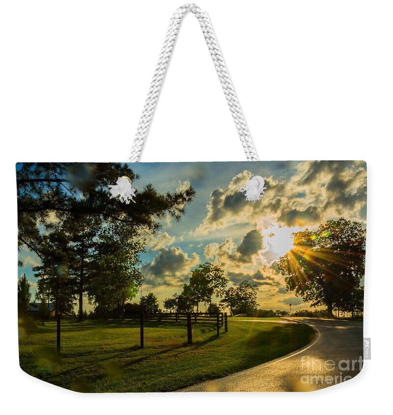 Sunlight Weekender Tote Bag featuring the photograph Sunlight around the Corner by Metaphor Photo
