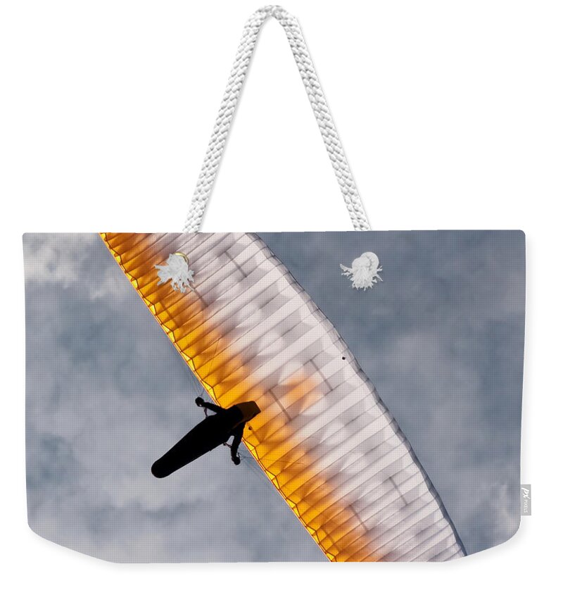 Paraglider Weekender Tote Bag featuring the photograph Sunlit Paraglider by Bel Menpes