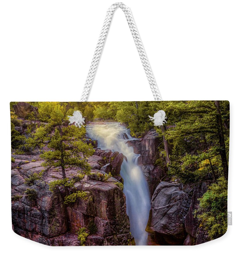 Flowing Weekender Tote Bag featuring the photograph Sunrise at Shell Falls by Rikk Flohr