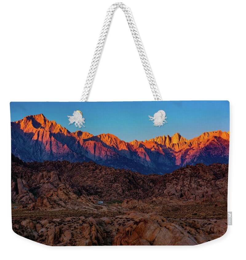 Alabama Hills Weekender Tote Bag featuring the photograph Sunrise Illuminating the Sierra by John Hight