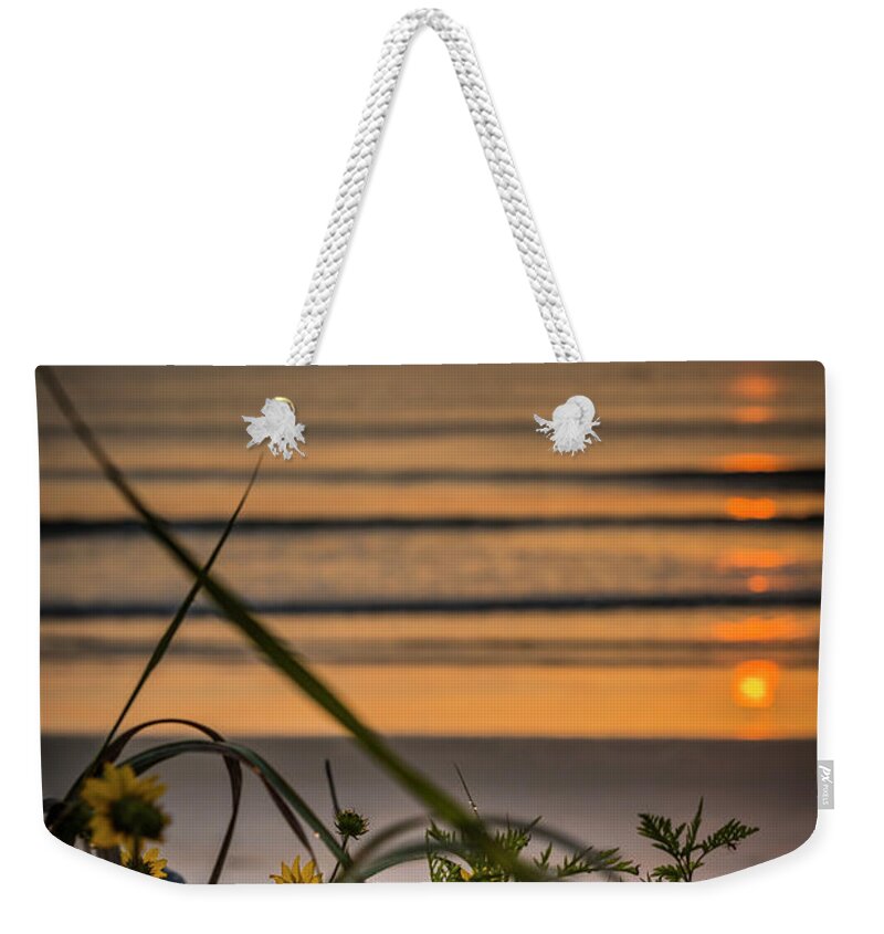Flagler Beach Weekender Tote Bag featuring the photograph Sunrise on a beach by Agnes Caruso