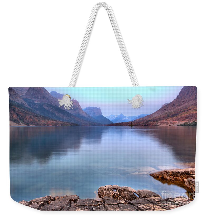 St Mary Weekender Tote Bag featuring the photograph Sunrise On The Eadge Of St. Mary Lake by Adam Jewell
