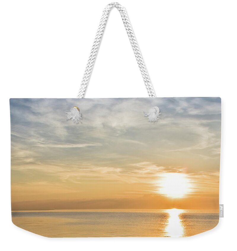 Chicago Weekender Tote Bag featuring the photograph Sunrise Over Lake Michigan in Chicago by David Levin